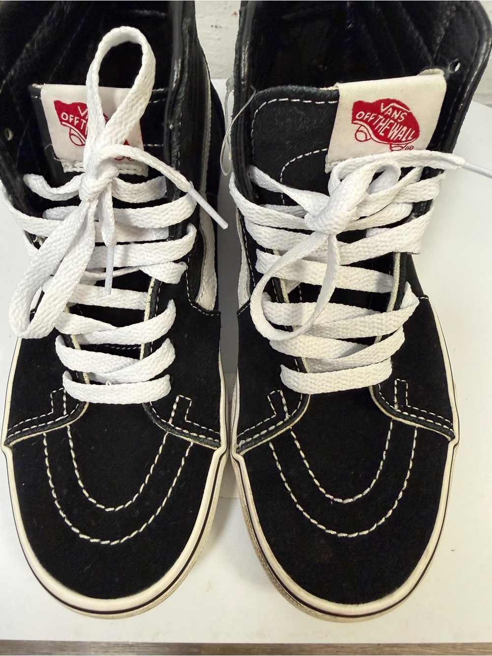 Vans Black and White High-Top Skate Sneakers with Red Logo